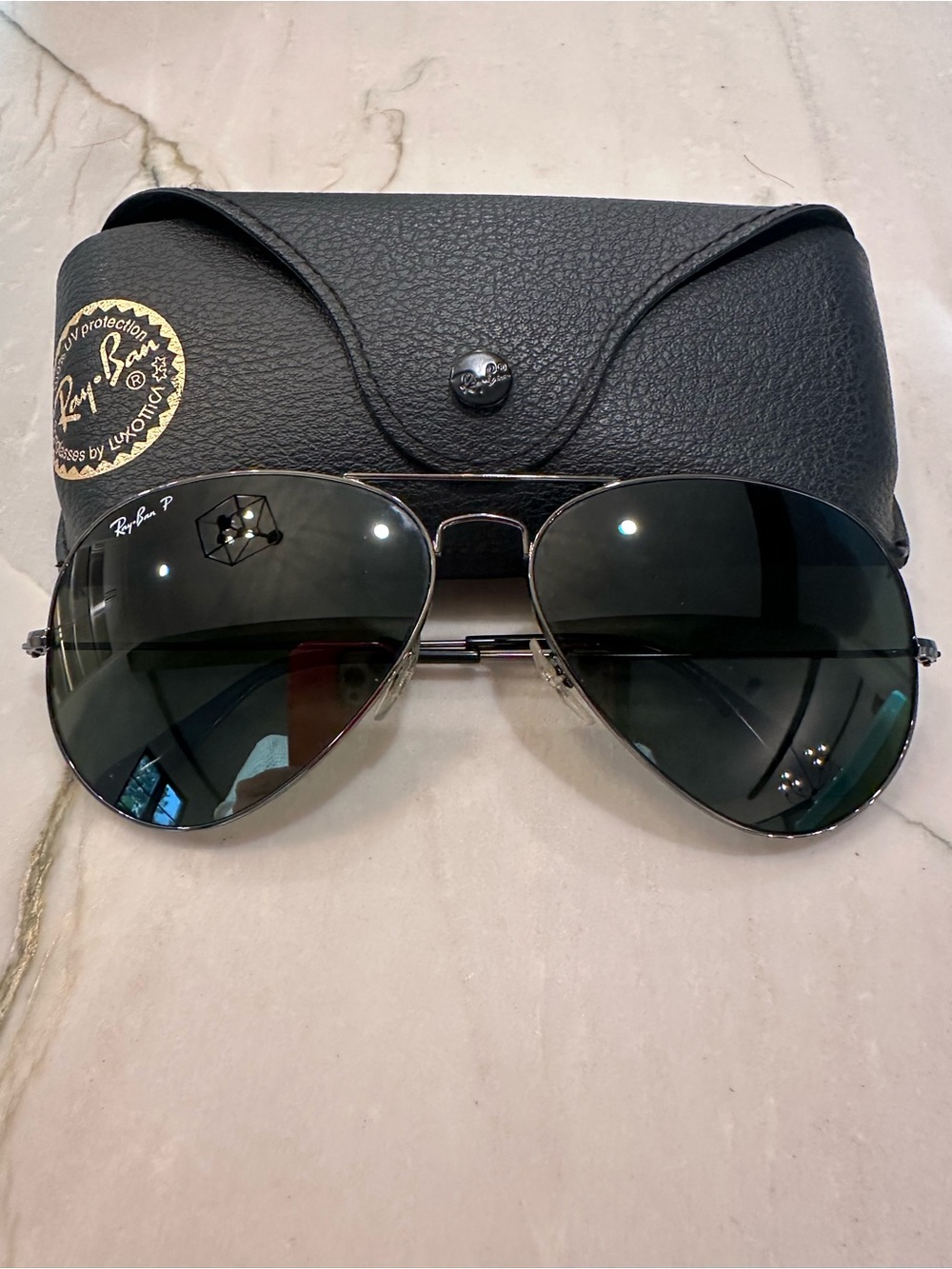 Ray-Ban Aviator Sunglasses with Dark Green Lenses and Silver Frames